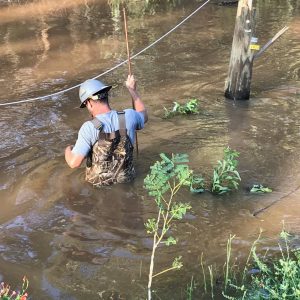 Diverse Power and assisting crews battled all sorts of obstacles while restoring power following Hurricane Michael, including wading through swamps to repair lines.