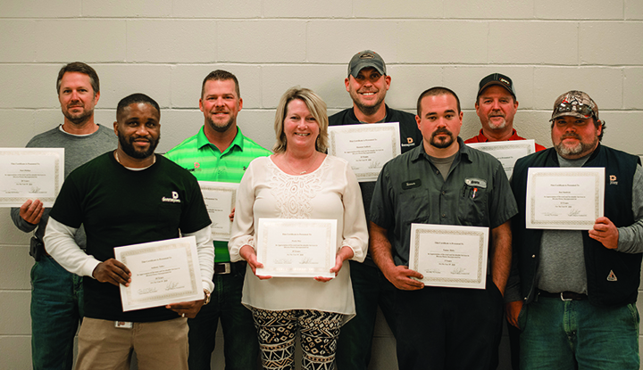 front row, from left, Anthony Talley (10 years of service), Paula May (15 years of service), Tanner Hicks (5 years of service) and Ben Shadrick (15 years of service). Back row, from left, Matt Phillips (20 years of service), Brent Loftin (20 years of service), Shannon Anthony (15 years of service) and Tim Reeves (5 years of service). Not pictured: Brannon Horne (10 years of service), Jamin Blair (15 years of service), Jimmy Hutto and Bubba Allen (20 years of service).